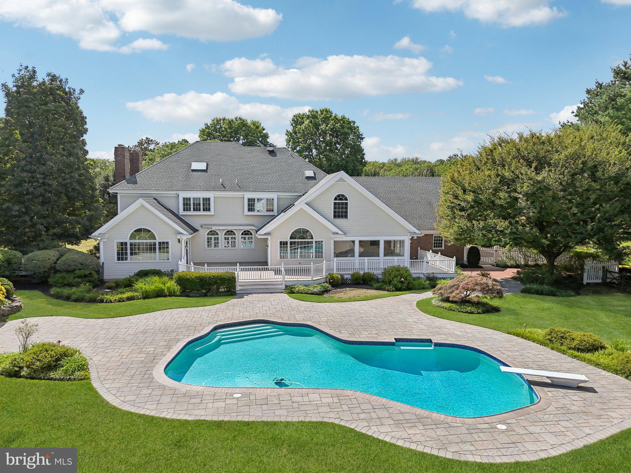 12 Paddock Drive New Hope, PA 18938 - Photo 35 of 42 an aerial view of a house with a yard table and chairs
