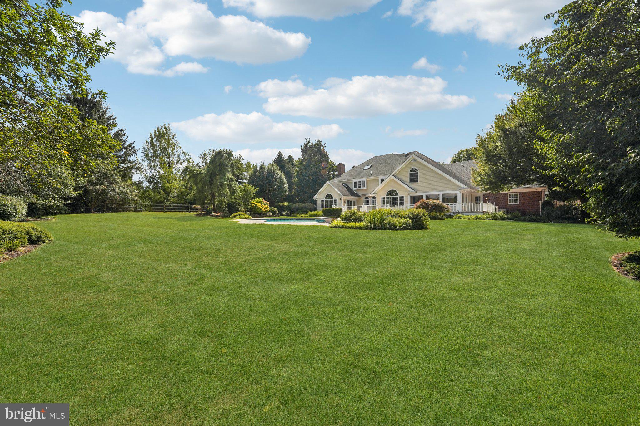 12 Paddock Drive New Hope, PA 18938 - Photo 38 of 42 a view of yard with trees and houses in the background