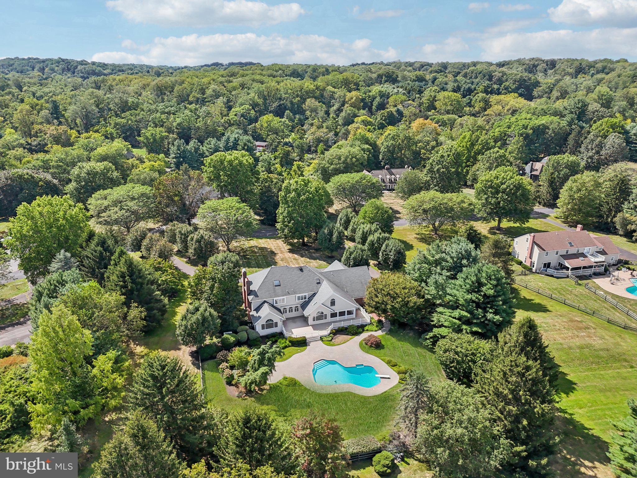 12 Paddock Drive New Hope, PA 18938 - Photo 39 of 42 an aerial view of a house with a swimming pool yard and outdoor seating