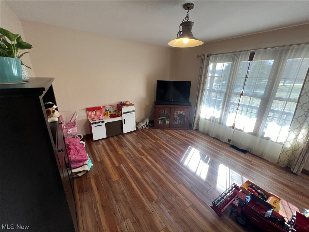 4512 Tabor Ridge Road Northeast Mineral City, OH 44656 - Photo 15 of 44 Rec room with dark hardwood / wood-style floors