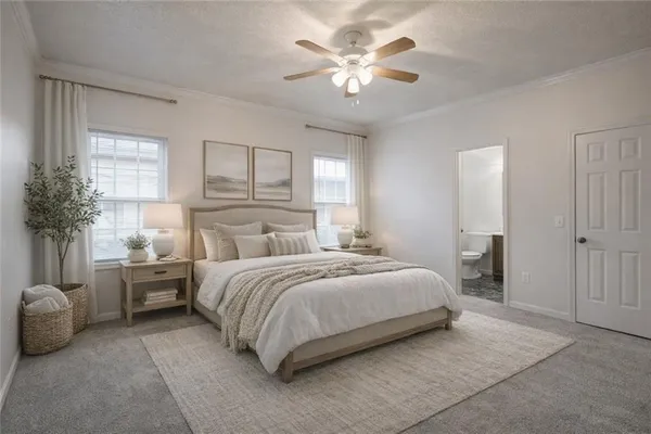 a bedroom with bed and a chandelier