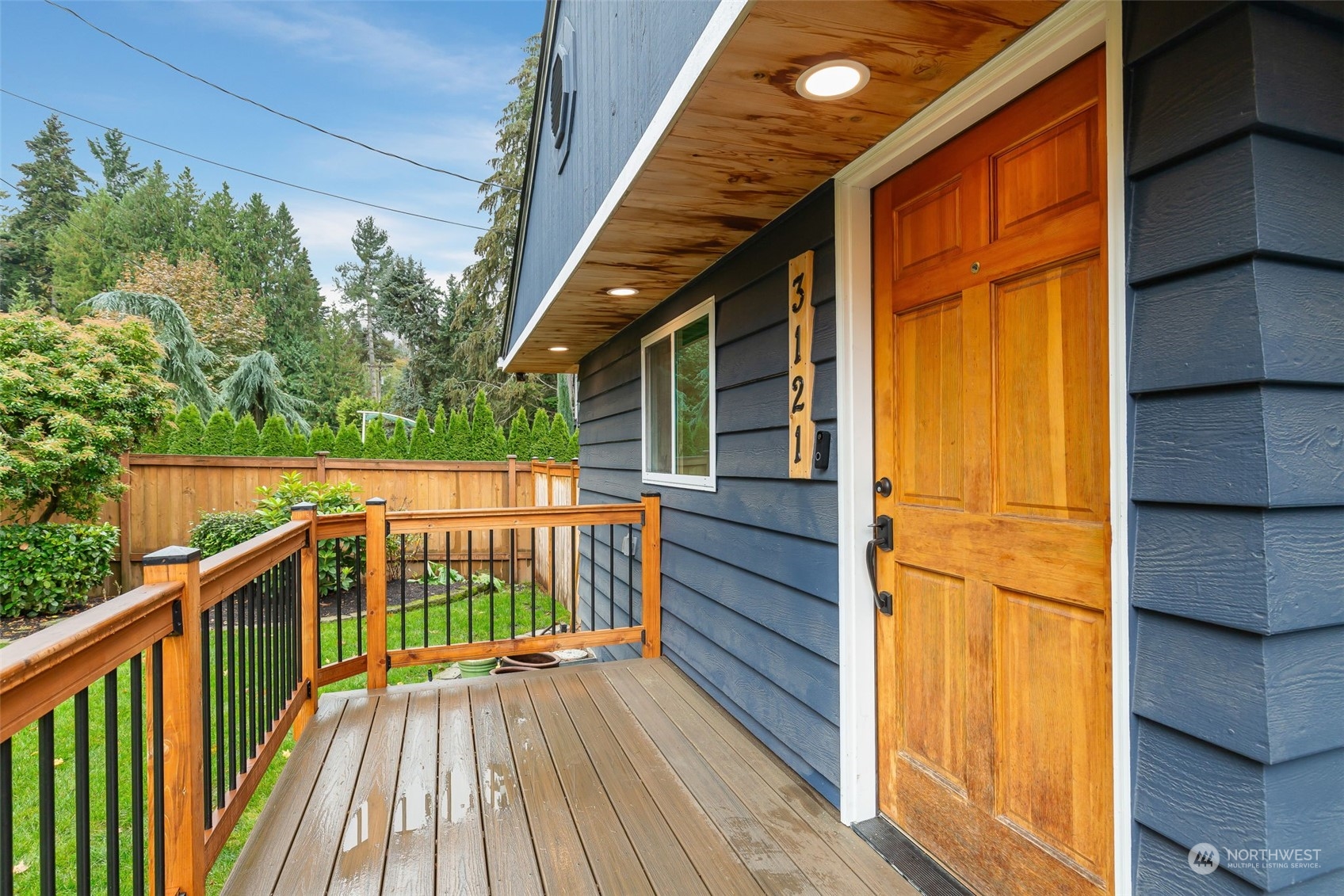 3121 Alaska Road Brier, WA 98036 - Photo 5 of 33 a balcony with wooden floor
