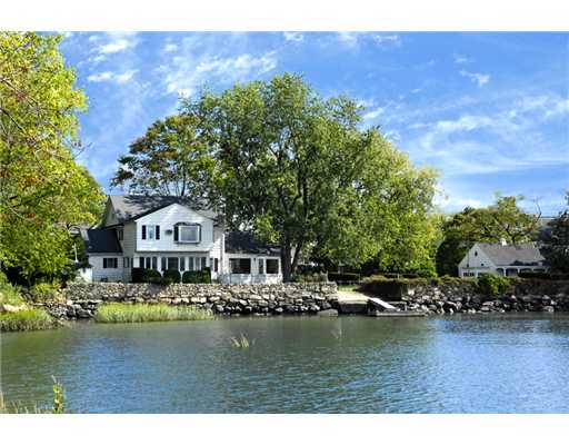 191 Shore Road Old Greenwich, CT 06870 - Photo 1 of 11 a view of a lake with houses