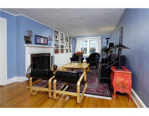 191 Shore Road Old Greenwich, CT 06870 - Photo 8 of 11 a living room with furniture flat screen tv and a fireplace