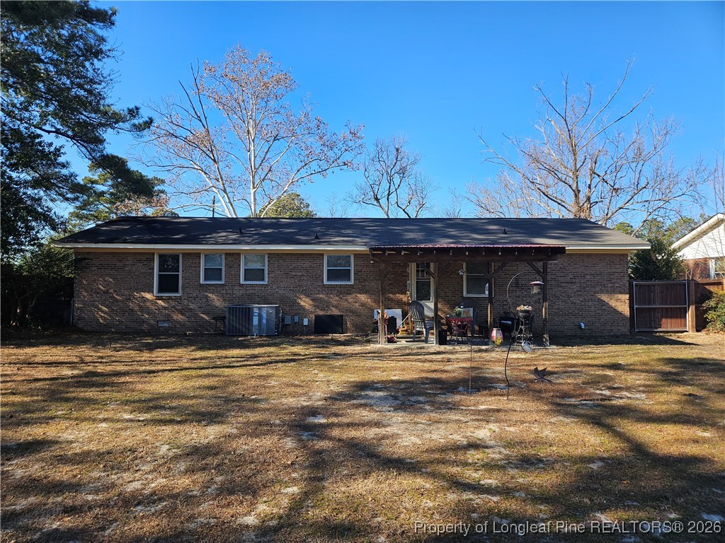 4547 Legion Road Hope Mills, NC 28348 - Photo 2 of 24 a front view of a house having patio