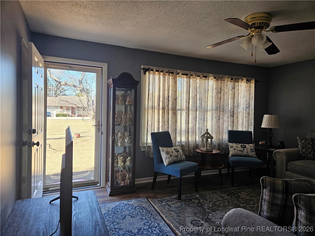 4547 Legion Road Hope Mills, NC 28348 - Photo 4 of 24 a living room with furniture and a window