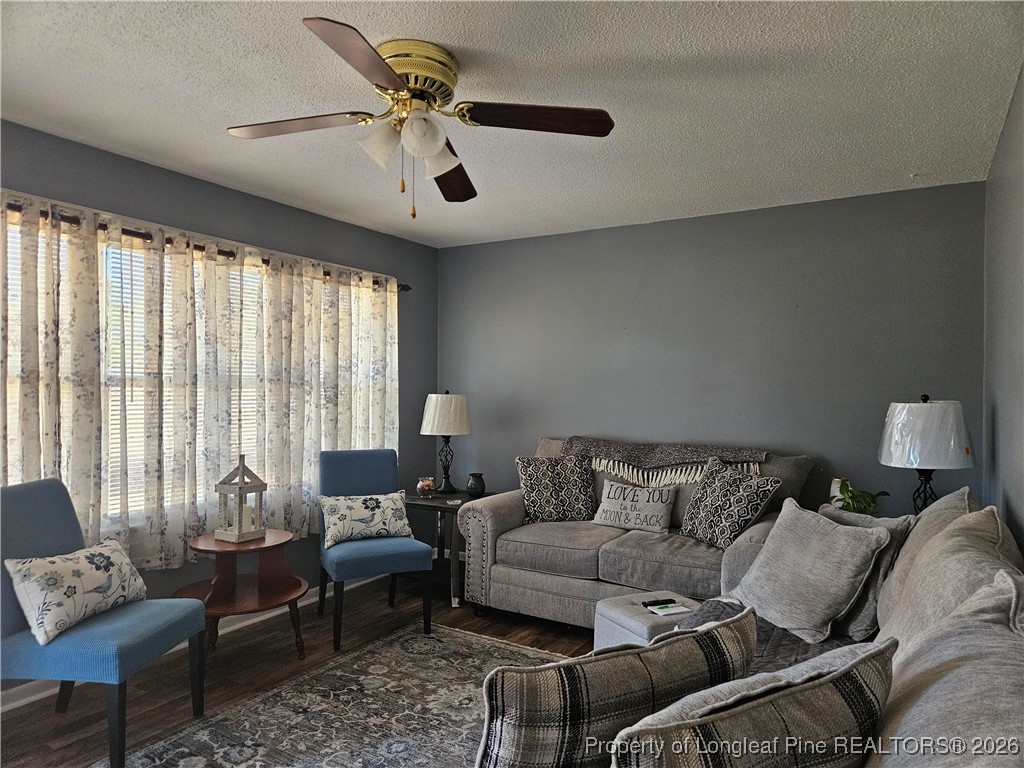 4547 Legion Road Hope Mills, NC 28348 - Photo 7 of 24 a living room with furniture and a large window
