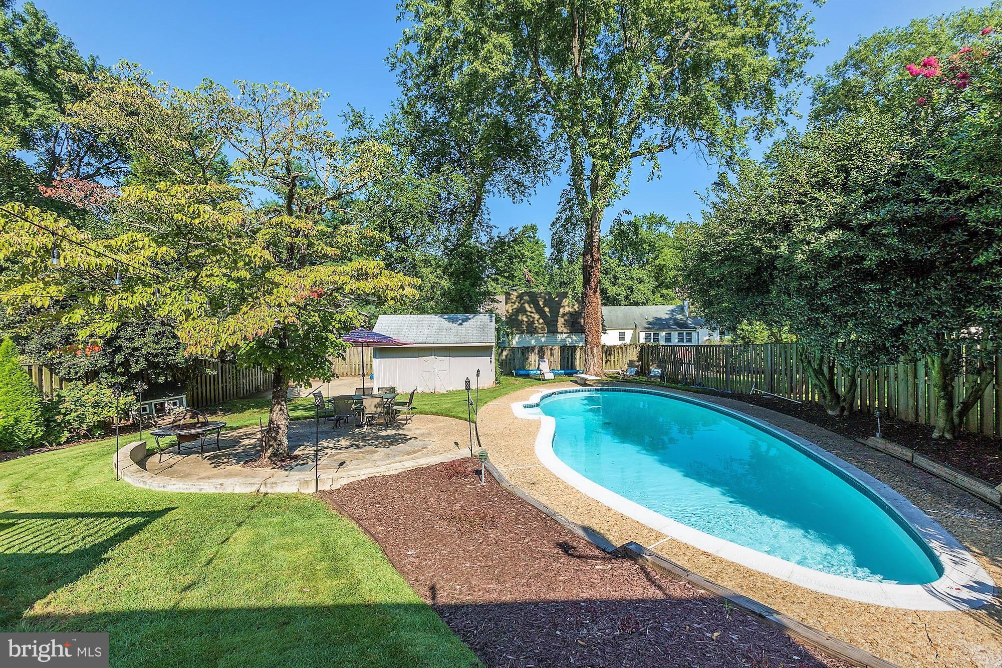 2926 Chestnut Road Edgewater, MD 21037 - Photo 19 of 30 Sunny bright landscaped yard with pool