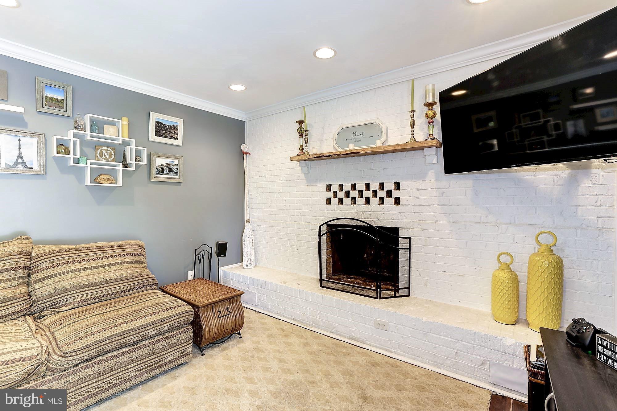2926 Chestnut Road Edgewater, MD 21037 - Photo 9 of 30 Spacious Family Rm w/wood buring firepalce