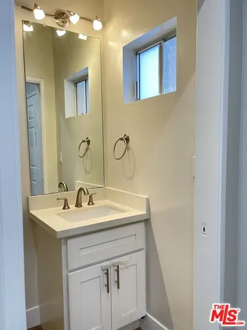 a bathroom with a sink and a toilet