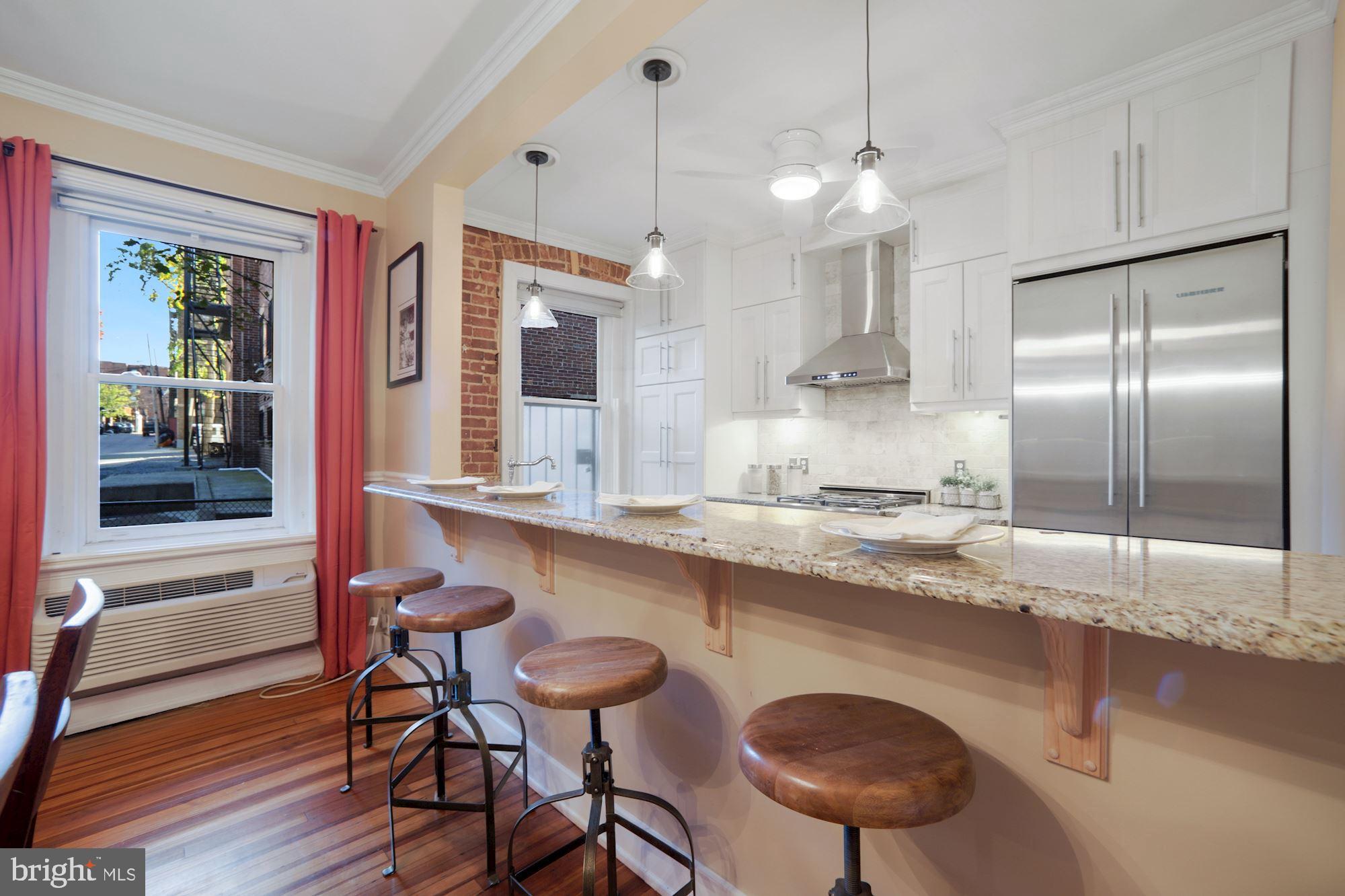 2415 20th Street Northwest, Unit 24 Washington, DC 20009 - Photo 15 of 33 Breakfast Bar with seating for 4!