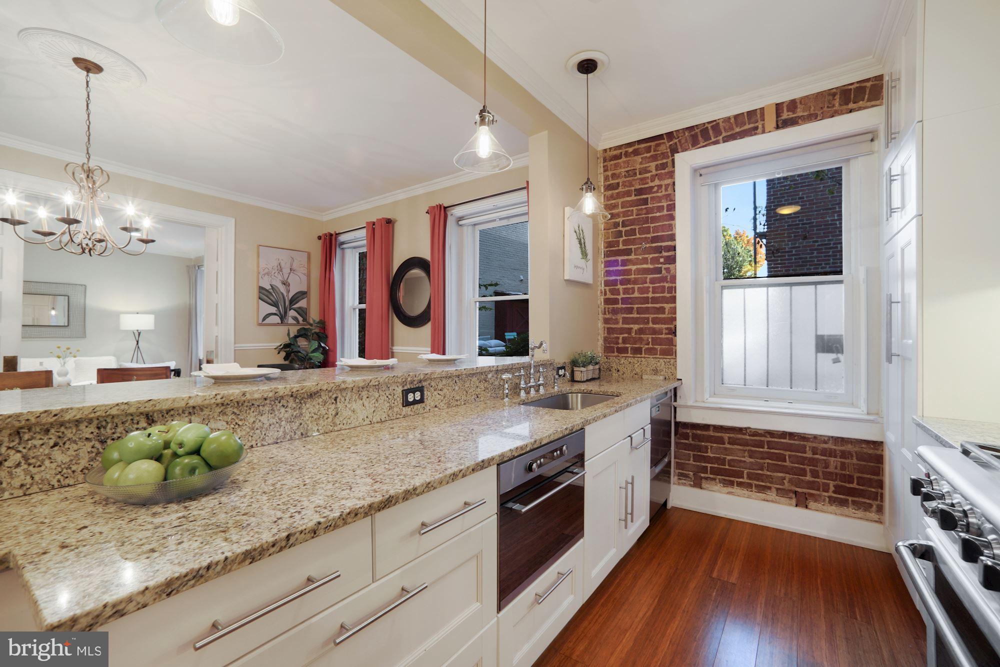 2415 20th Street Northwest, Unit 24 Washington, DC 20009 - Photo 18 of 33 Exposed brick, it's all about the finishes!
