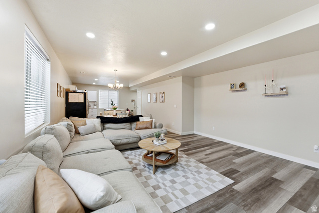 1434 West Stable Street Lindon, UT 84042 - Photo 37 of 76 Living room with wood finished floors and suspended lighting