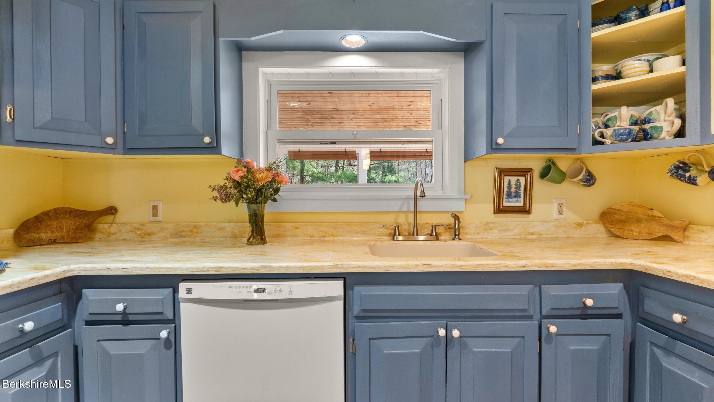 7 Lake Buel Road Great Barrington, MA 01230 - Photo 15 of 42 a kitchen with a sink and cabinets