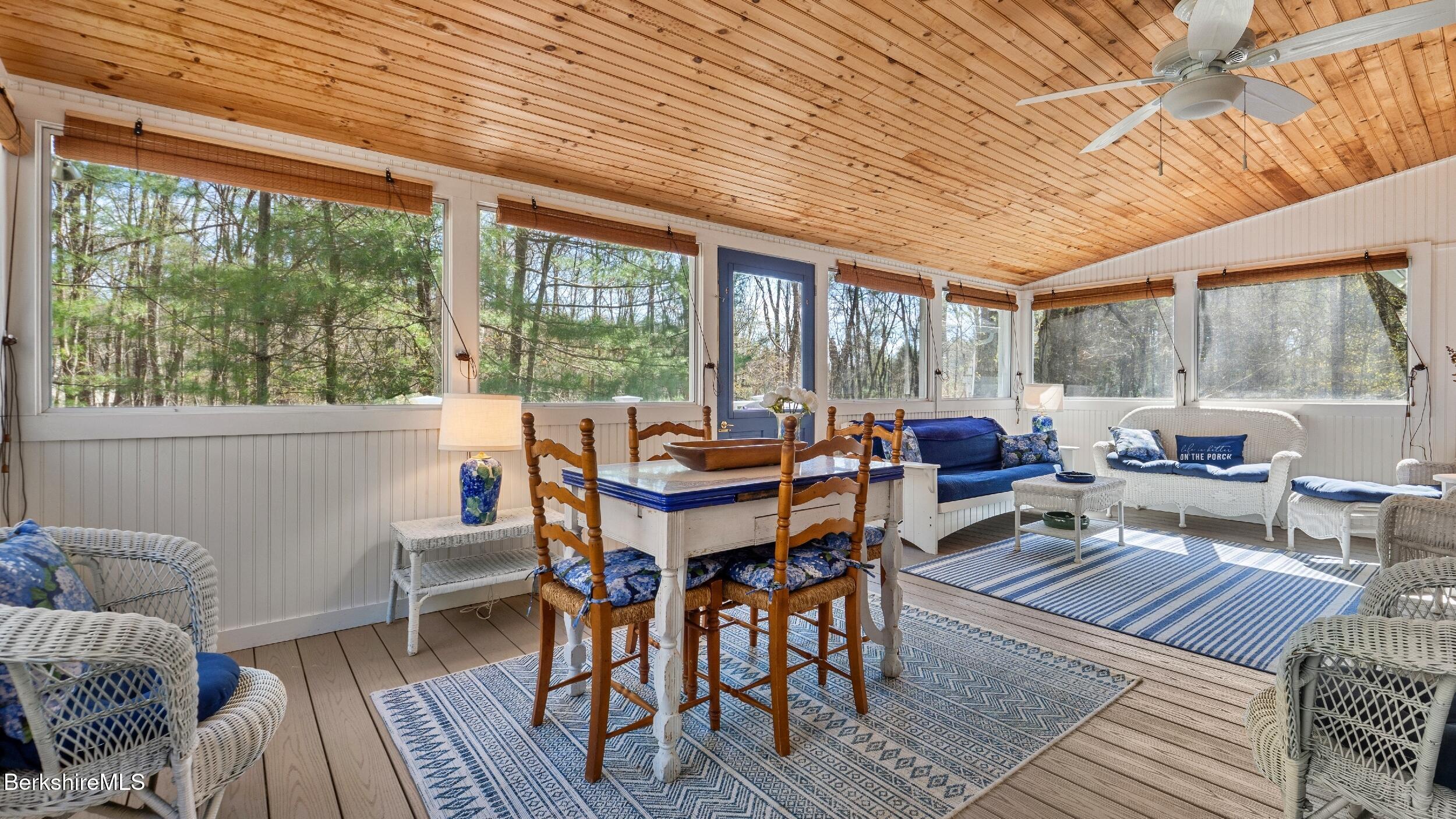 7 Lake Buel Road Great Barrington, MA 01230 - Photo 16 of 42 a view of a dining room with furniture window and outside view