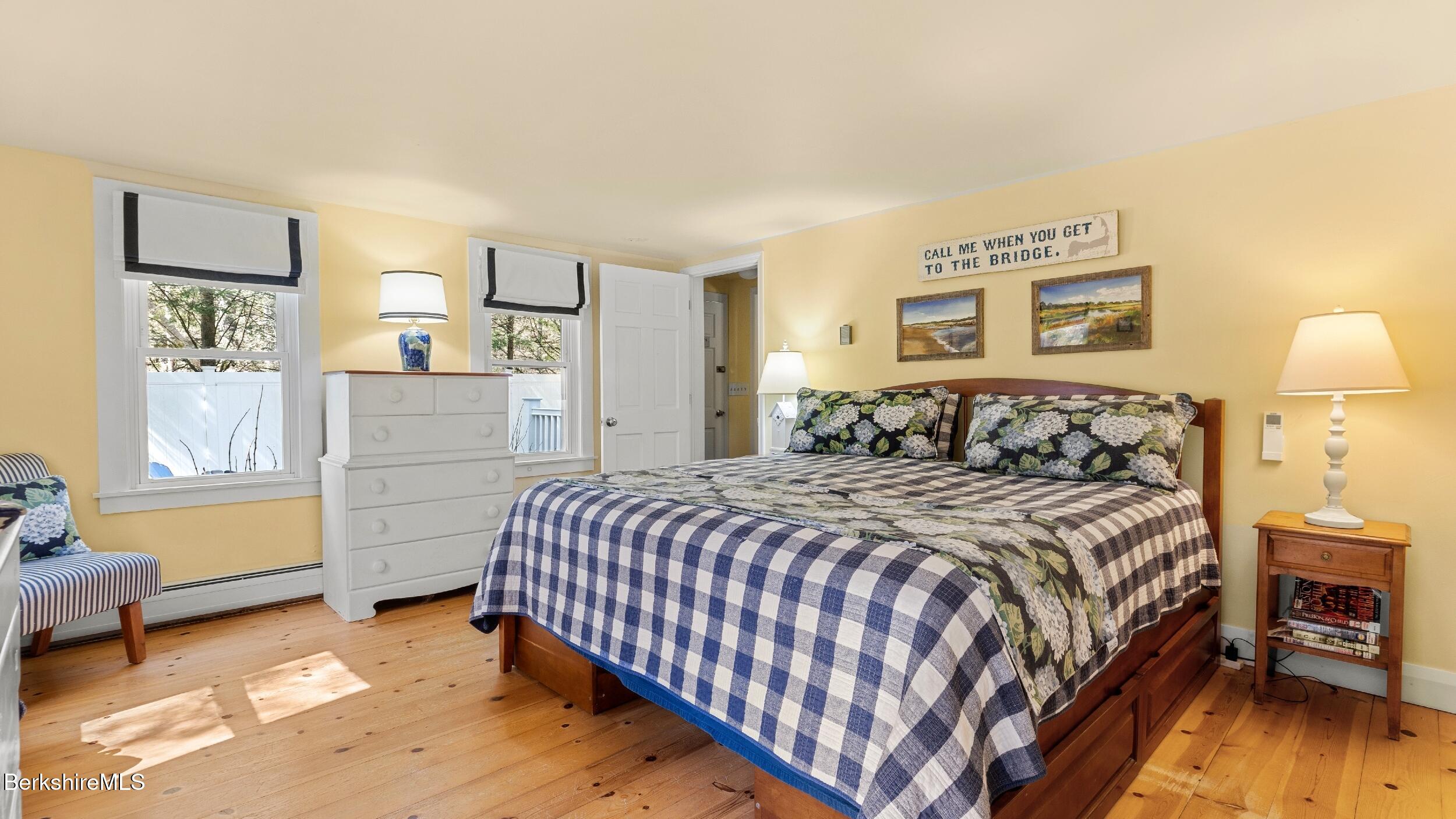 7 Lake Buel Road Great Barrington, MA 01230 - Photo 20 of 42 a bedroom with a bed and a dresser