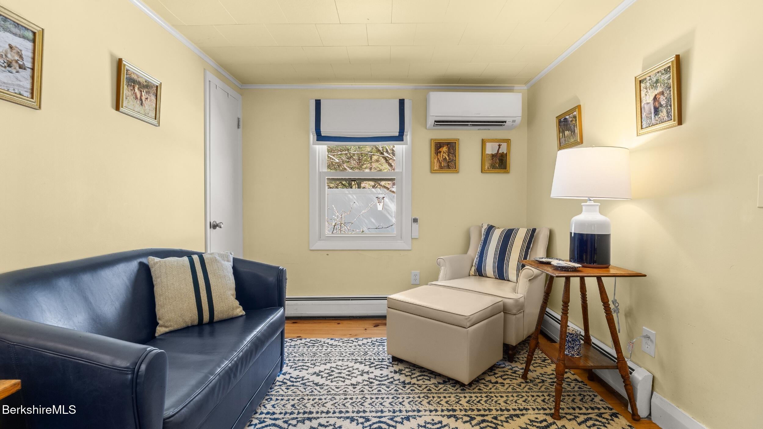 7 Lake Buel Road Great Barrington, MA 01230 - Photo 24 of 42 a living room with furniture and a couch