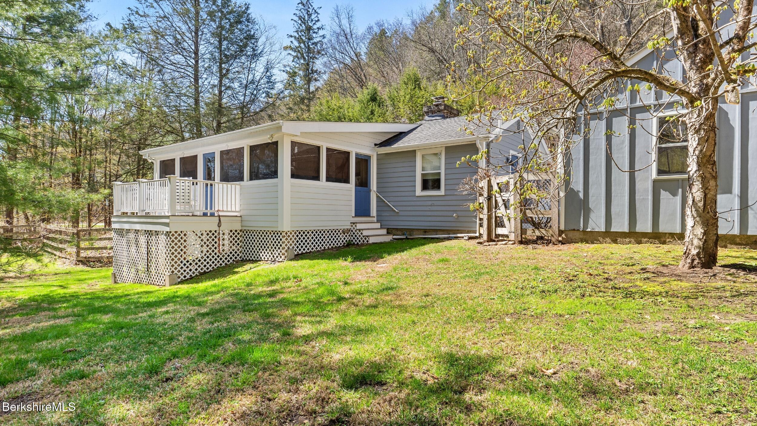 7 Lake Buel Road Great Barrington, MA 01230 - Photo 3 of 42 a front view of house with yard and seating area