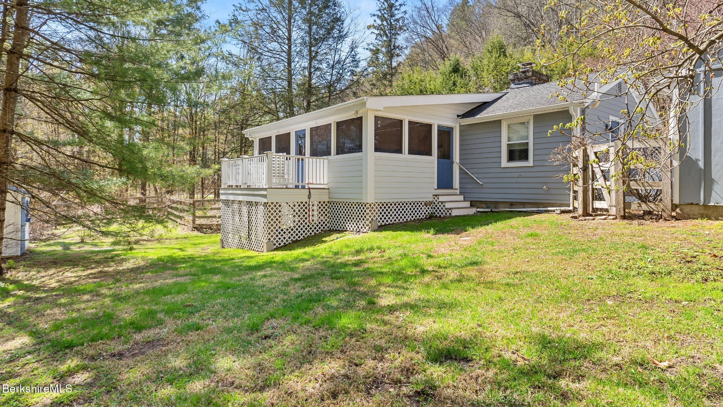 7 Lake Buel Road Great Barrington, MA 01230 - Photo 33 of 42 a front view of a house with a yard