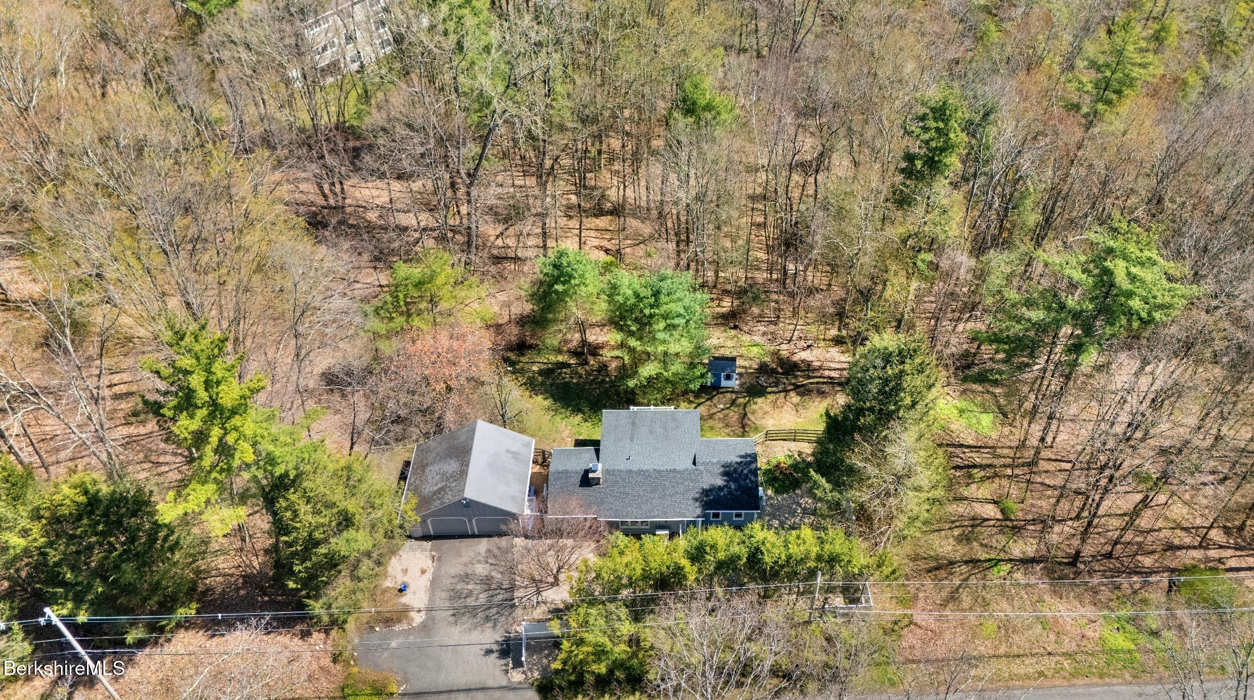 7 Lake Buel Road Great Barrington, MA 01230 - Photo 38 of 42 an aerial view of a house with a yard