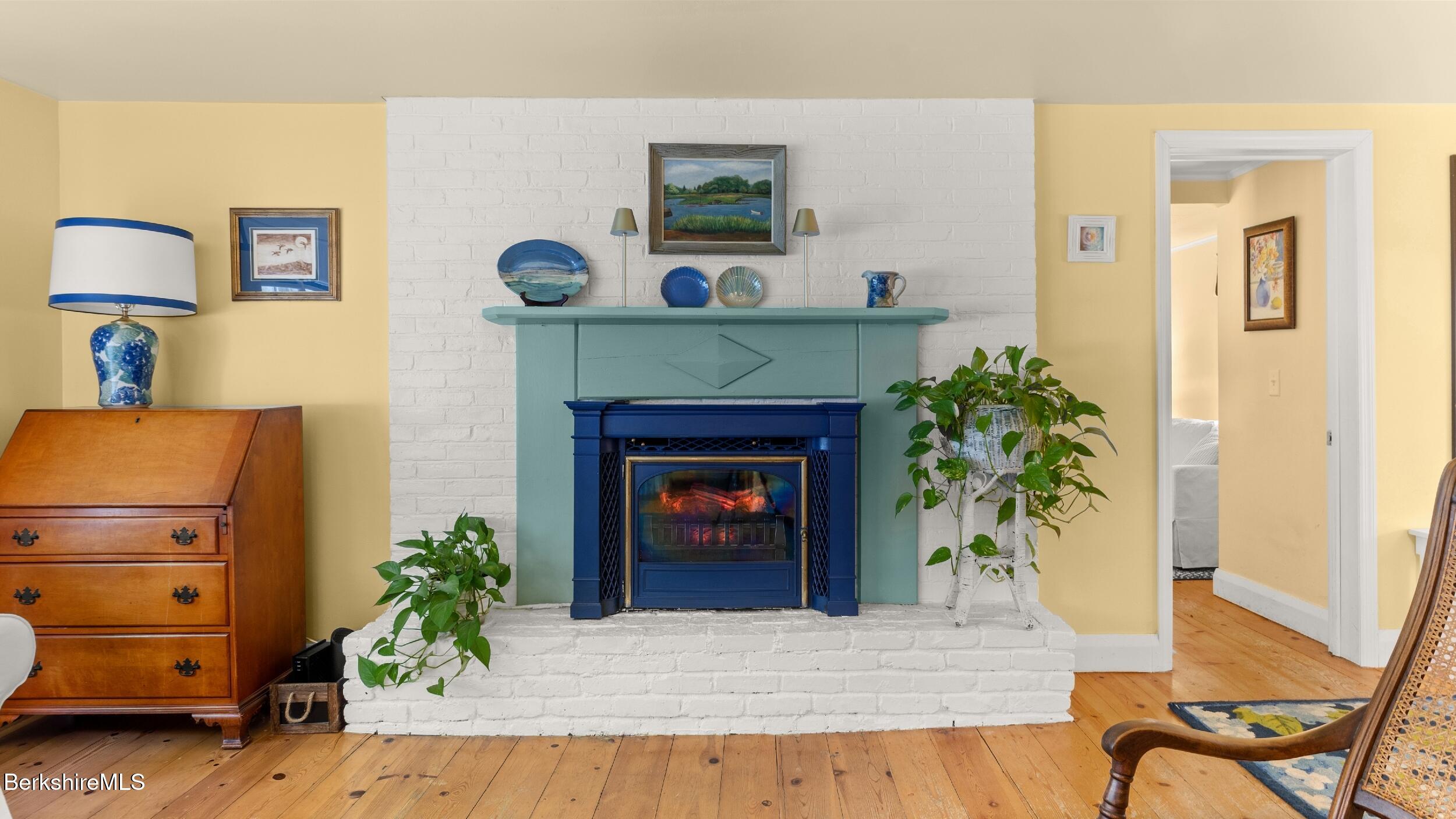 7 Lake Buel Road Great Barrington, MA 01230 - Photo 9 of 42 a living room with furniture and a fireplace