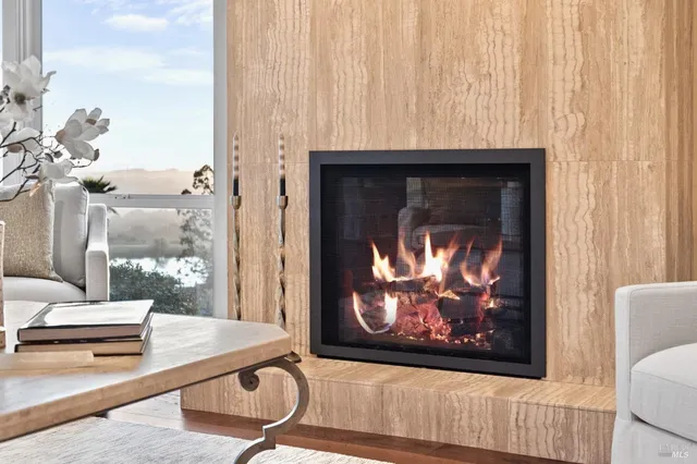 a bedroom with a large bed and a dresser