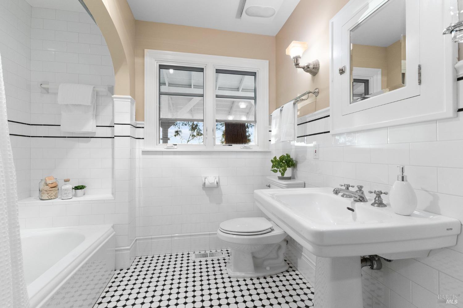 4680 Acacia Lane Penngrove, CA 94951 - Photo 37 of 83 a bathroom with a sink a toilet and shower