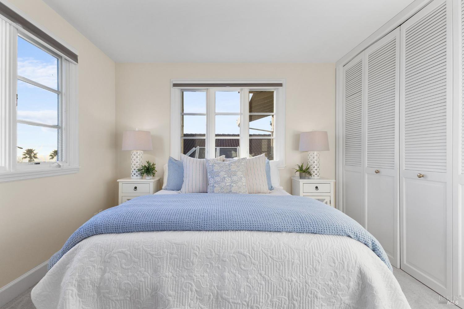 4680 Acacia Lane Penngrove, CA 94951 - Photo 57 of 83 a bedroom with a large bed and a window