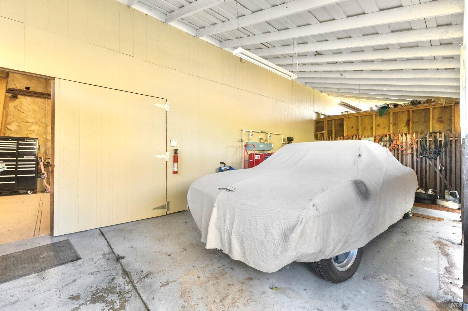 4680 Acacia Lane Penngrove, CA 94951 - Photo 65 of 83 a bed sitting in a spacious bedroom next to a window