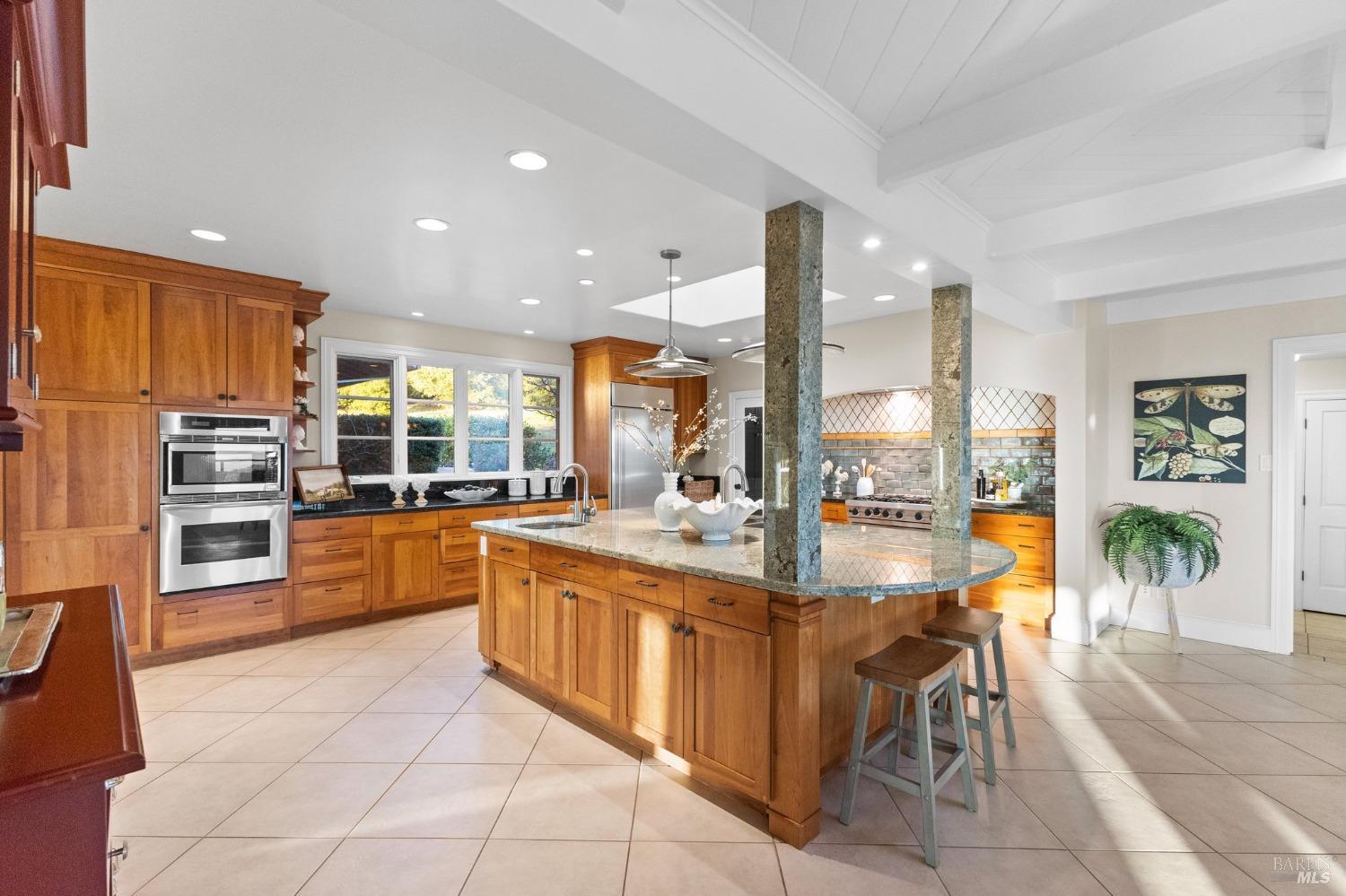 4680 Acacia Lane Penngrove, CA 94951 - Photo 10 of 83 a large kitchen with lots of counter and chairs