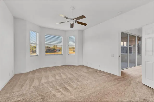 a view of empty room with windows