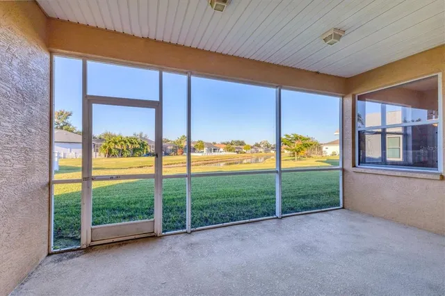 a view of a room with a large window