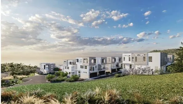 a view of a house with a big yard and large trees