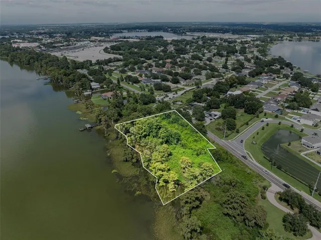 a view of a lake with a yard
