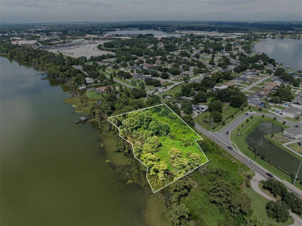 a view of a lake with a yard
