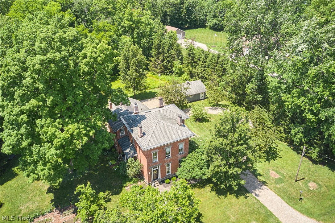 5046 Alger Road Richfield, OH 44286 - Photo 48 of 49 Brick exterior with a gabled roof and multiple chimneys