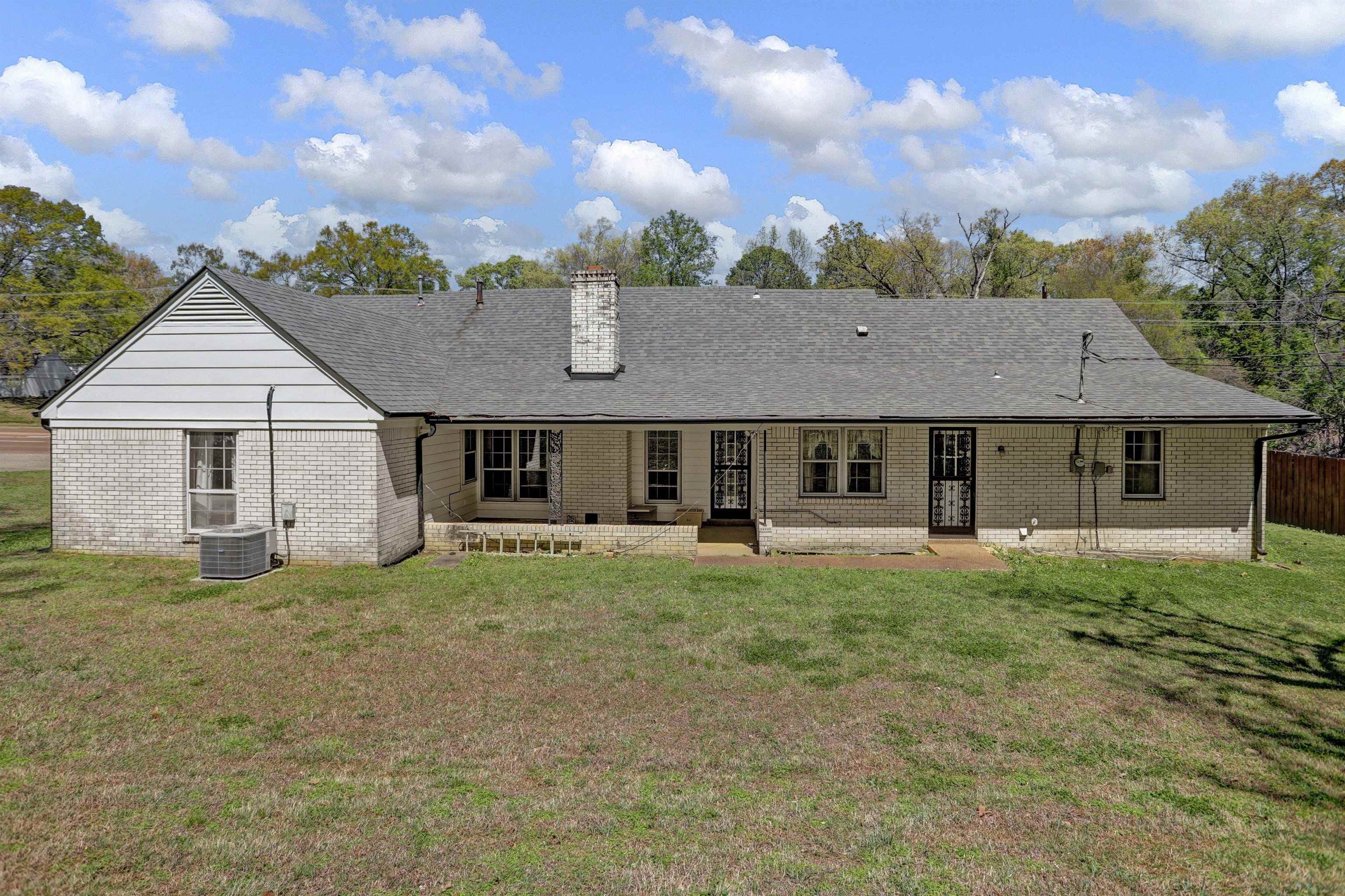 4755 Stage Road Memphis, TN 38128 - Photo 2 of 31 front view of a house with a yard
