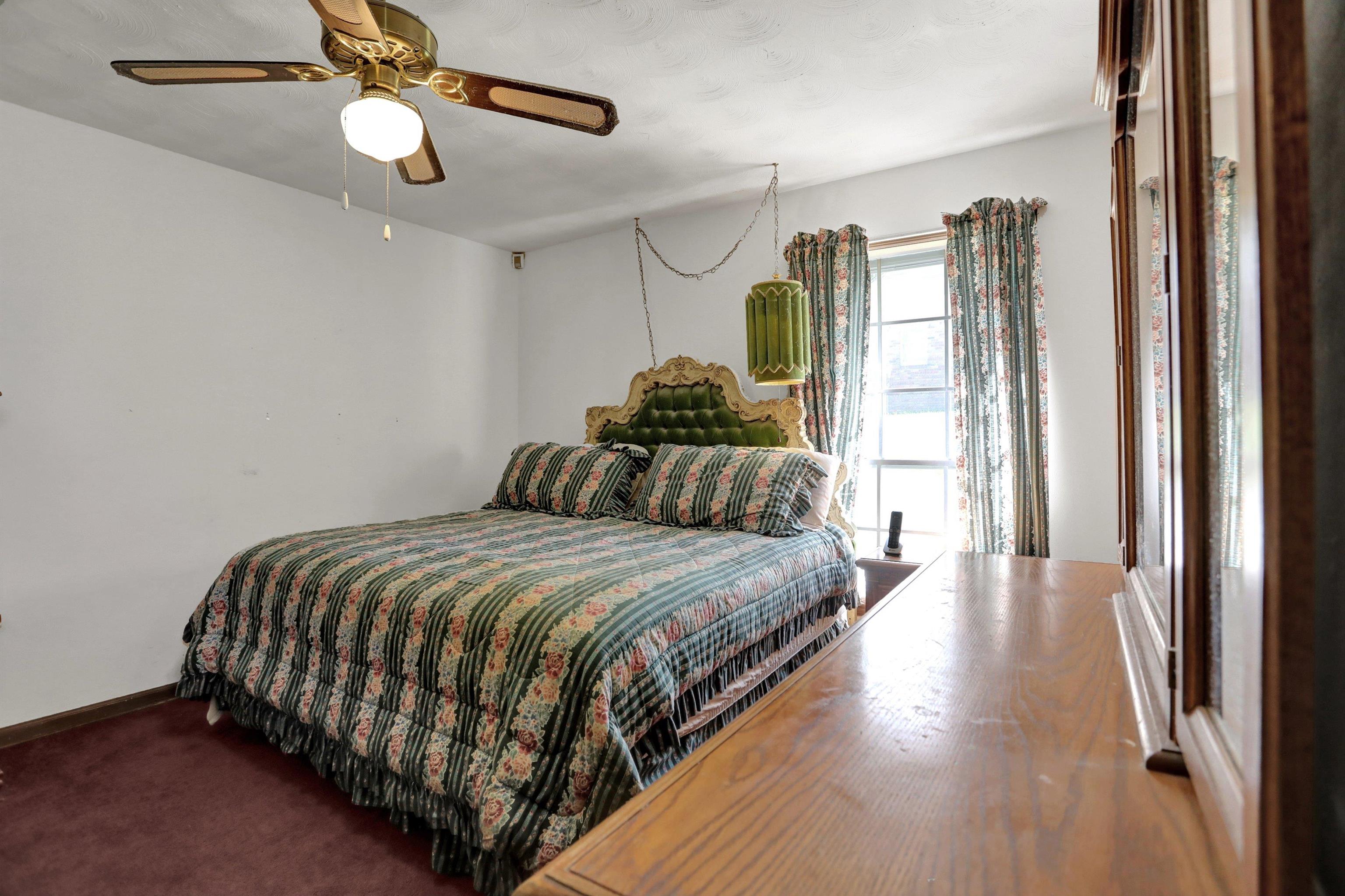 4755 Stage Road Memphis, TN 38128 - Photo 6 of 31 a bedroom with bed and window