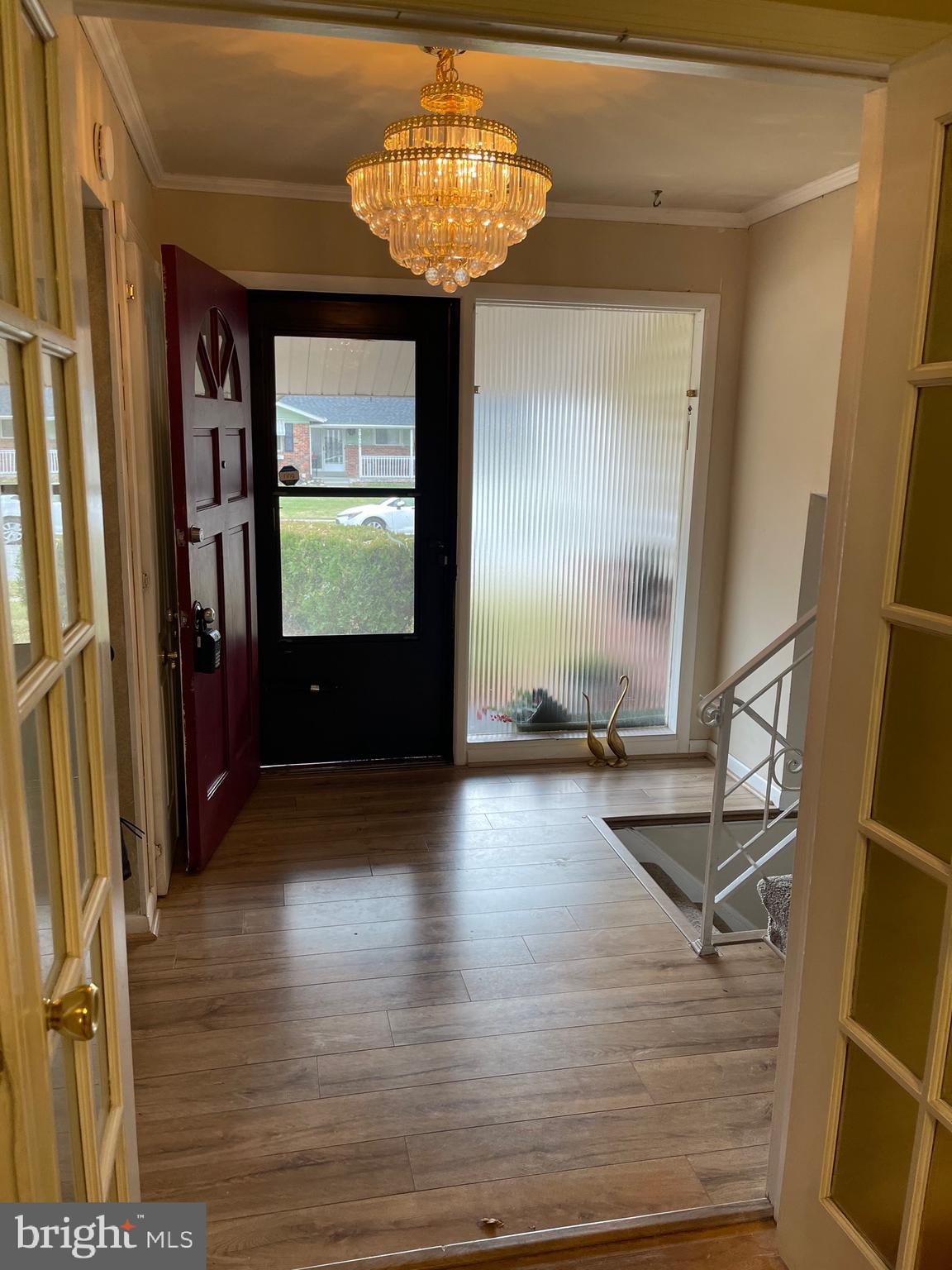 7012 Dolphin Road Lanham, MD 20706 - Photo 20 of 35 Foyer stairs to Upper and Lower Levels