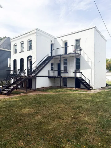 a house view with a garden space