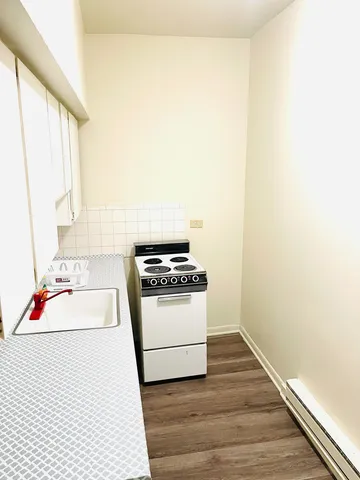 a utility room with washer and dryer