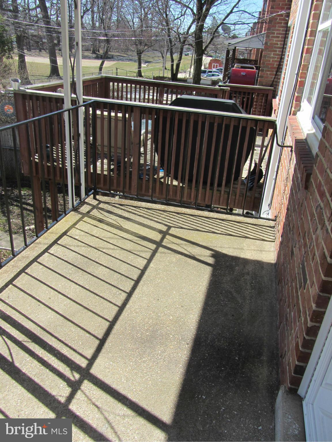 8655 Oak Road Baltimore, MD 21234 - Photo 23 of 27 a view of balcony with wooden floor