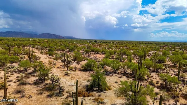 a view of an outdoor space and mountain from yard