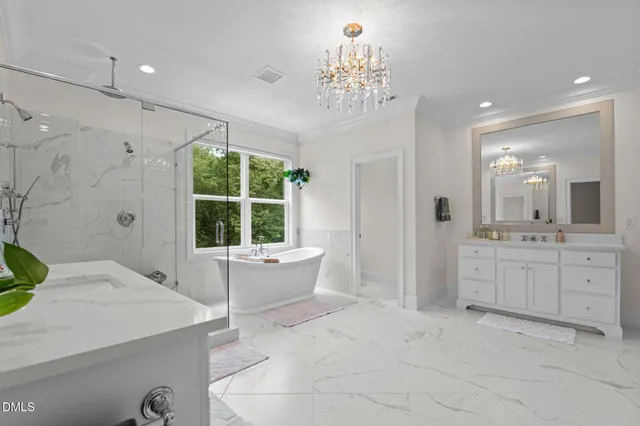 a bathroom with a granite countertop sink mirror and toilet