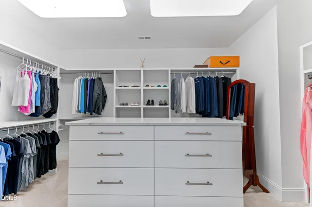 an aerial view of a house with outdoor space