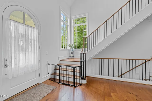 a view of entryway with wooden floor