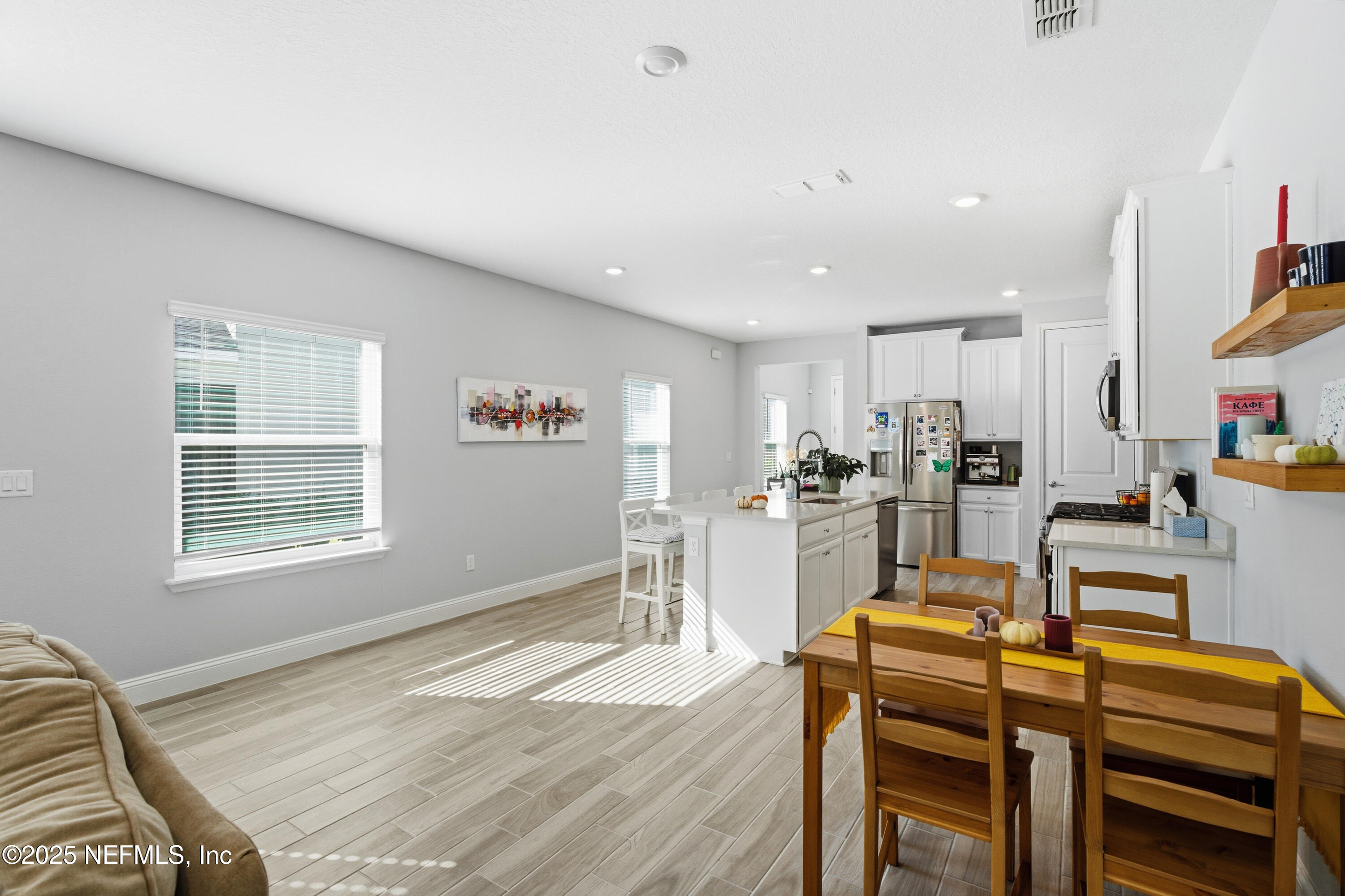 165 Killarney Avenue St. Johns, FL 32259 - Photo 15 of 63 a view of a dining room with furniture and a window