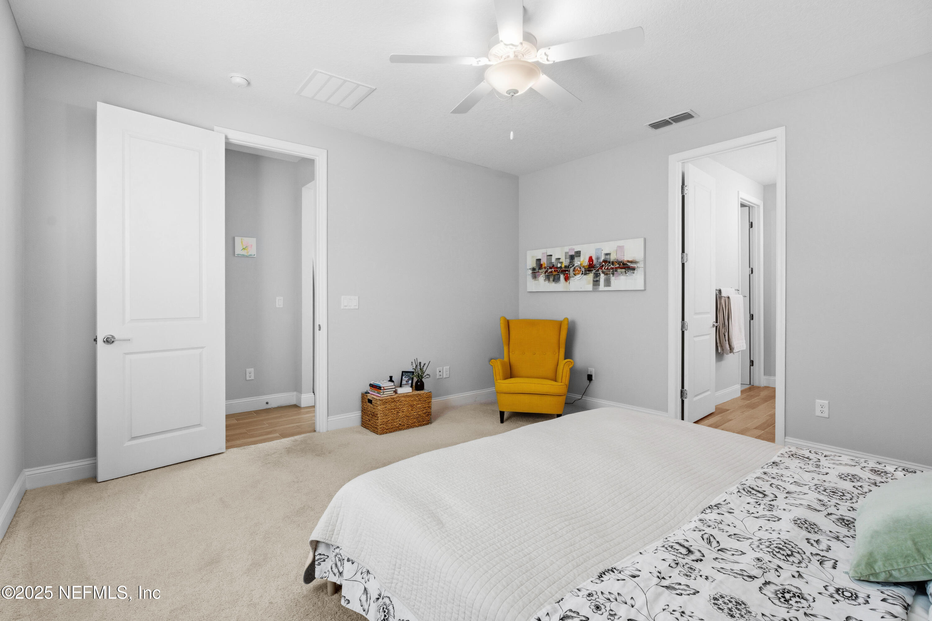 165 Killarney Avenue St. Johns, FL 32259 - Photo 17 of 63 a bedroom with a bed and ceiling fan