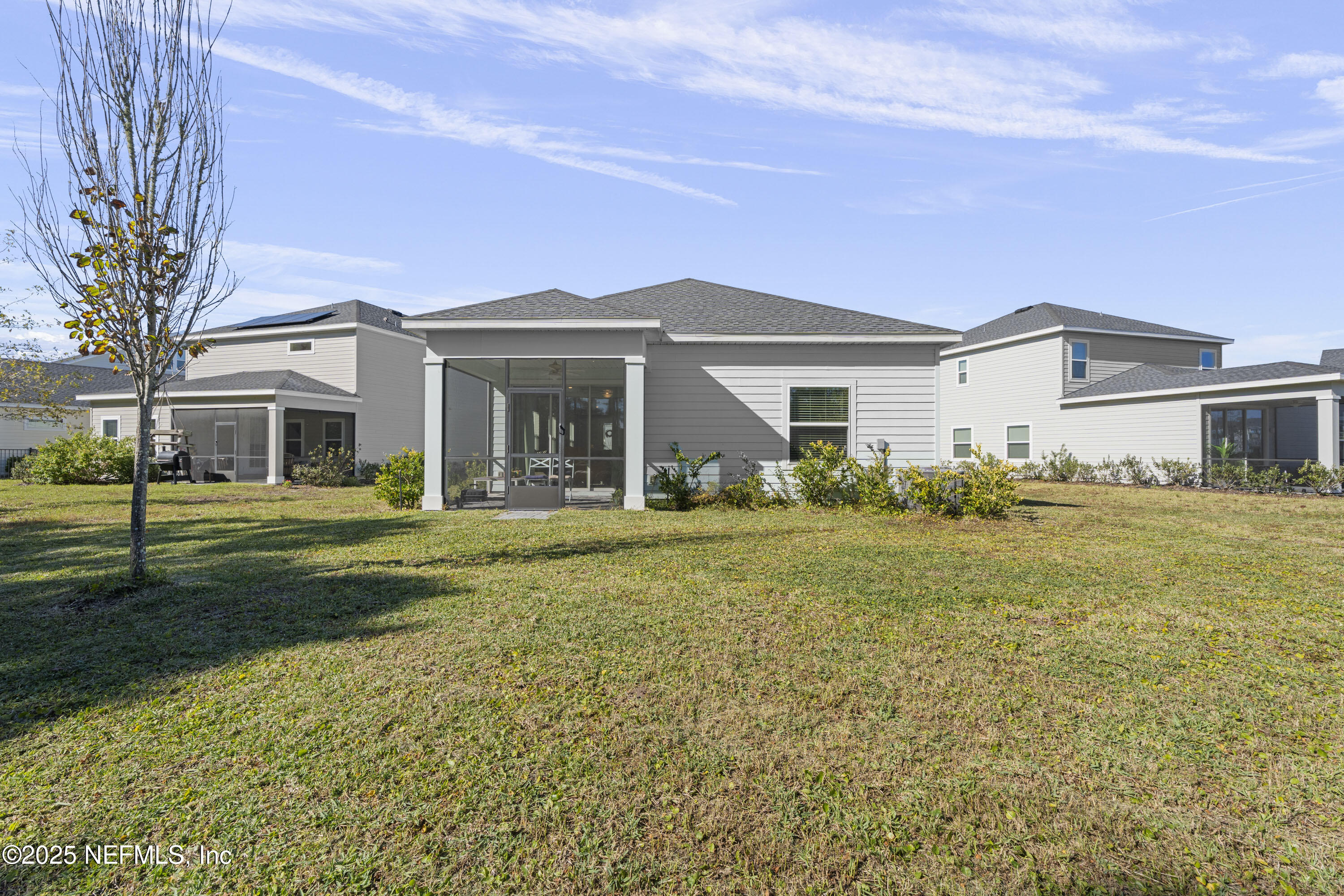 165 Killarney Avenue St. Johns, FL 32259 - Photo 32 of 63 a front view of a house with a garden