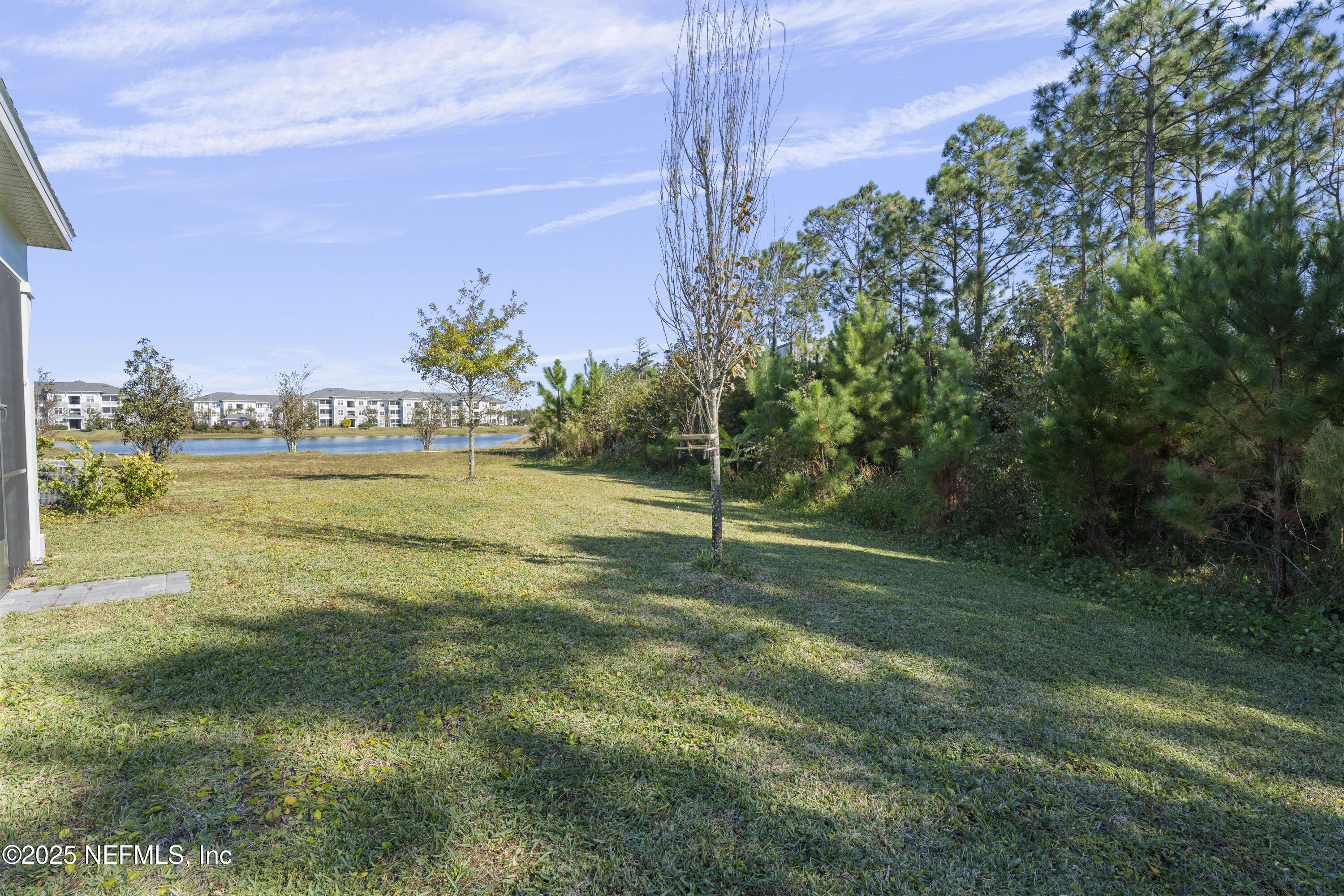 165 Killarney Avenue St. Johns, FL 32259 - Photo 34 of 63 a view of a city with tall buildings and a big yard